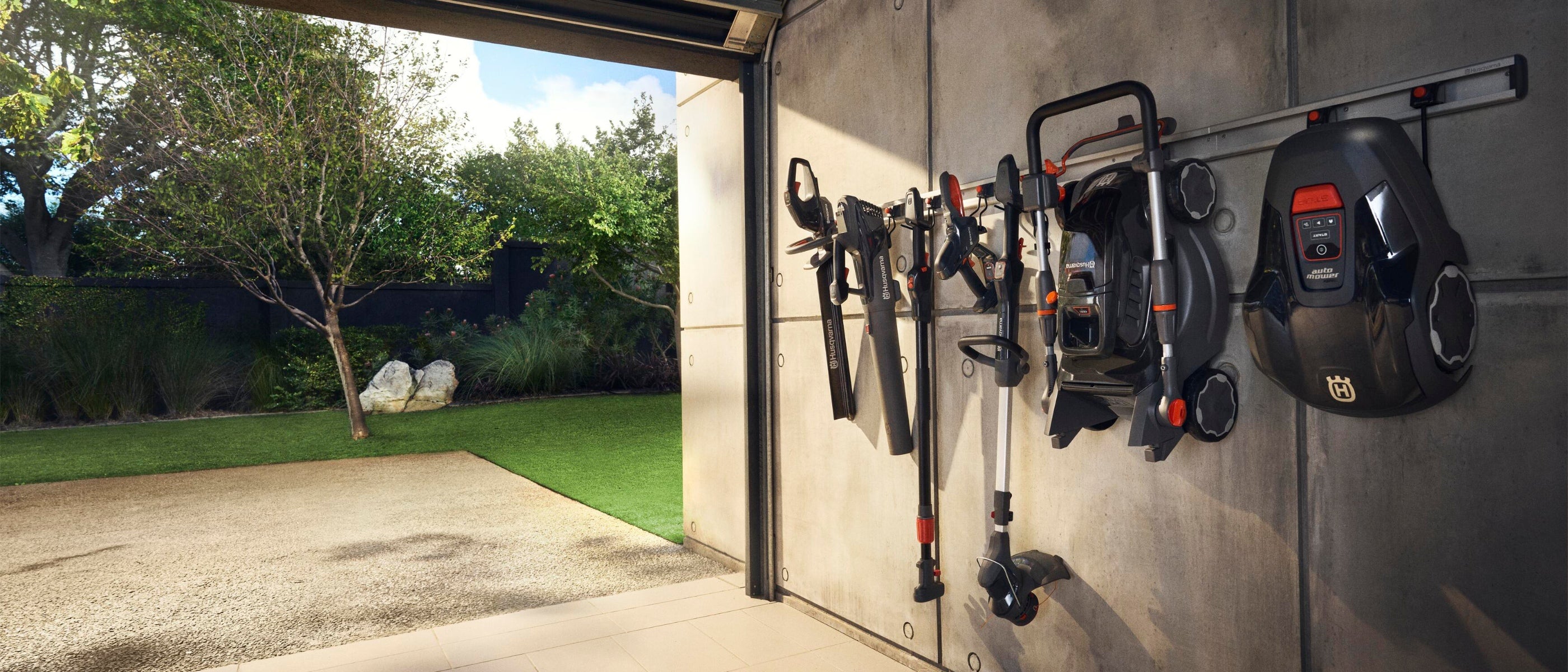 MowBot | Aspire Battery Garden Tools | Range hanging on garage wall