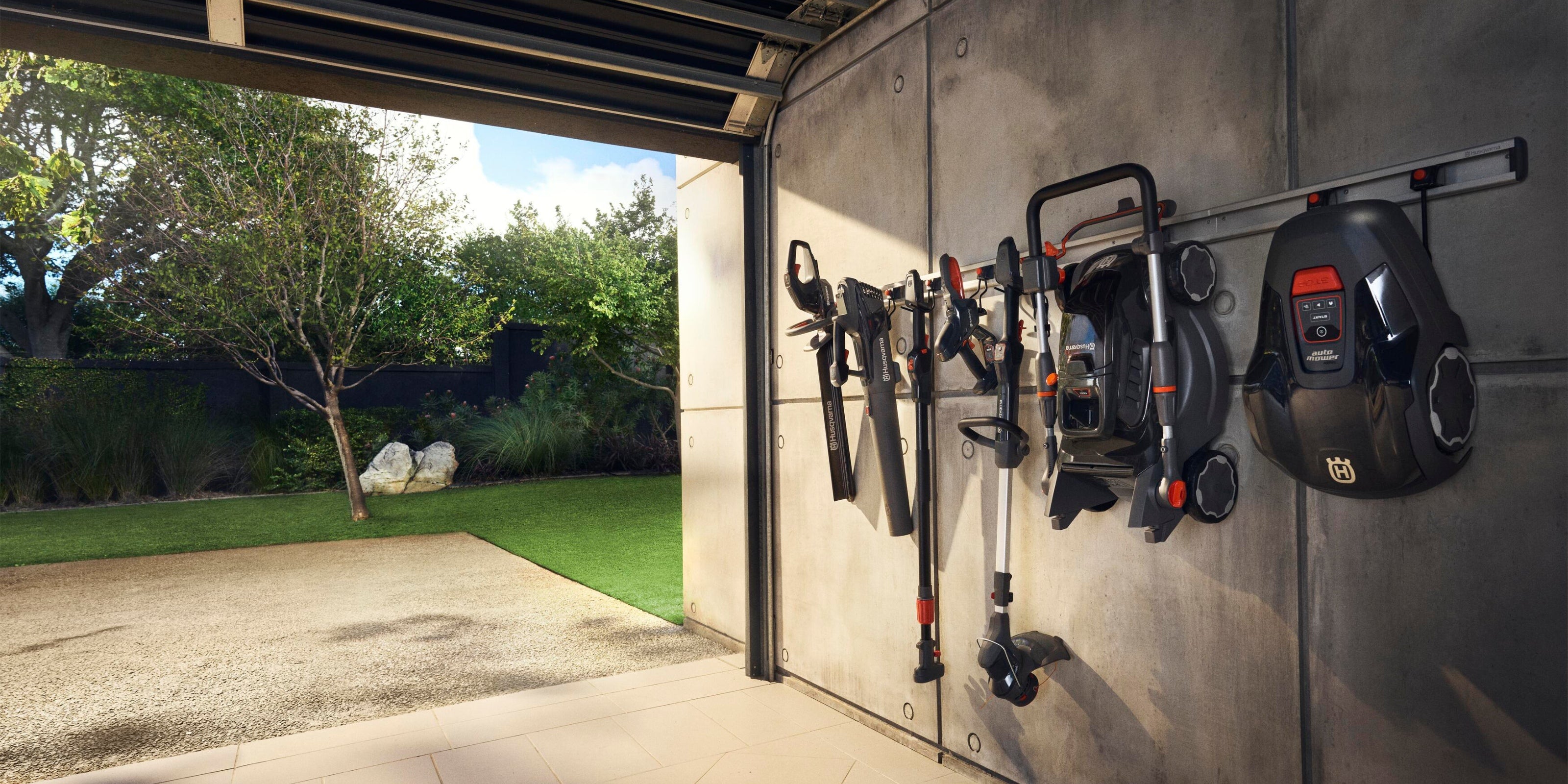 MowBot | Aspire Battery Garden Tools | Range hanging on garage wall